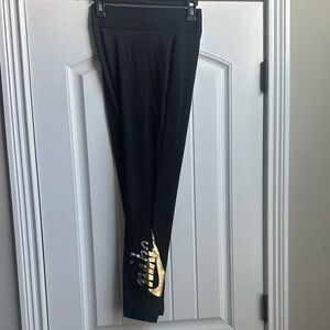 Nike Women Leggings in Black with Gold Accent